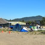 Grants Pass officers are citing people with disabilities for not moving from city campsites for unsheltered residents